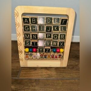 B. Toys AB3's Wooden Abacus Stand with alphabets and numbers